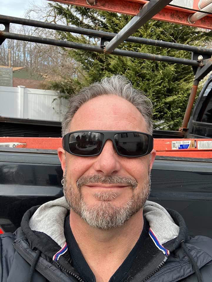 Jeff working on a garage door